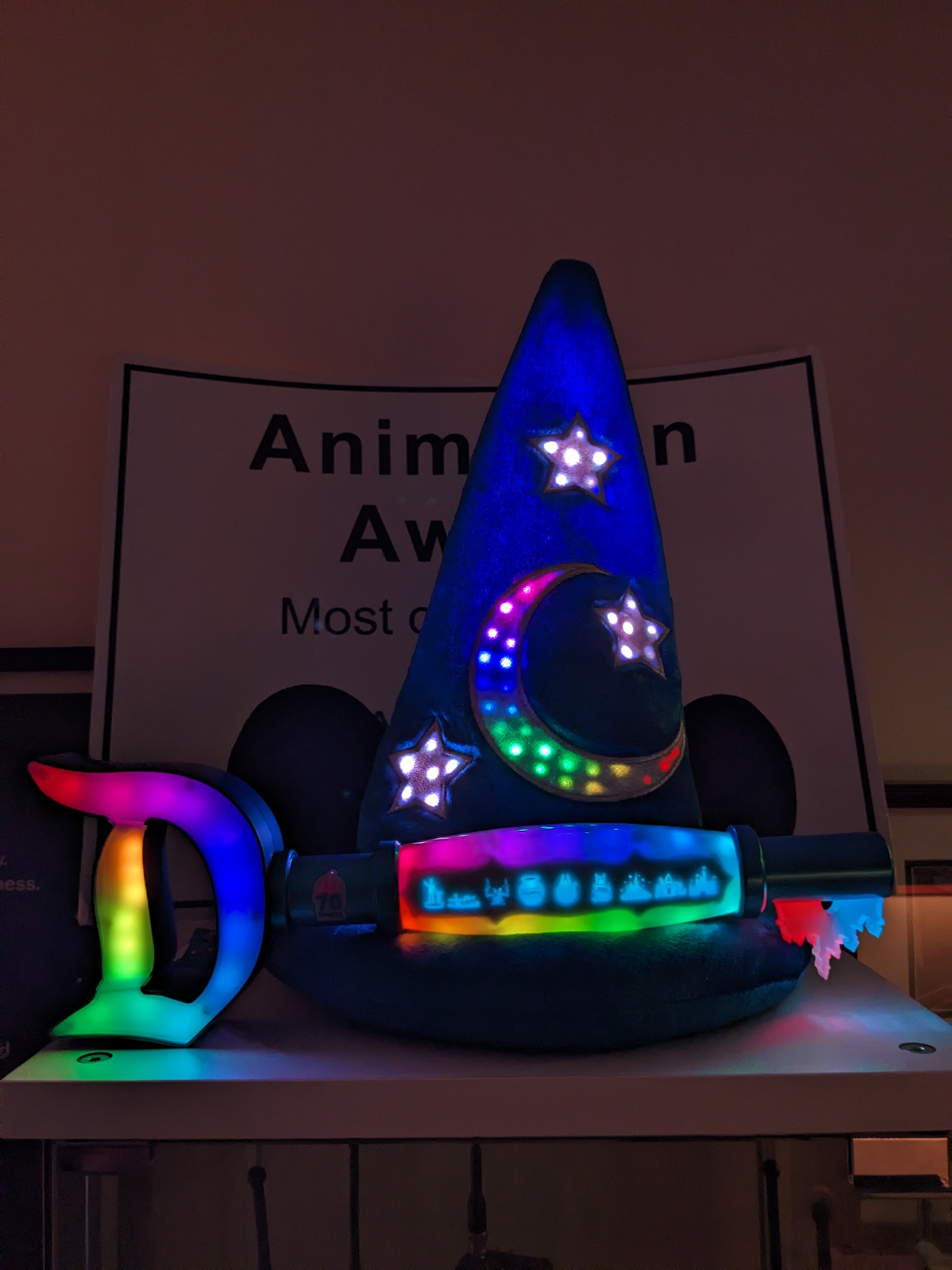 70th Anniversary Key next to my custom Mickey Sorcerer's hat